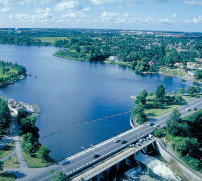 The dams at Hogs Back created a large slackwater section of the Rideau Riverknown as Mooneys Bay