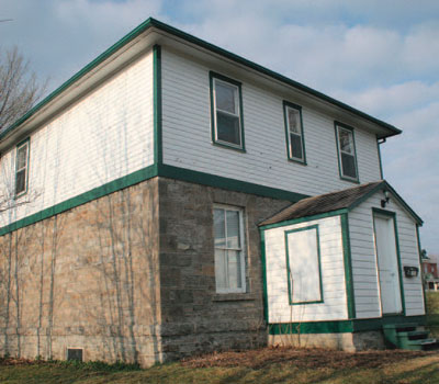 A second storey and an addition were added to the defensible lockmaster's house.