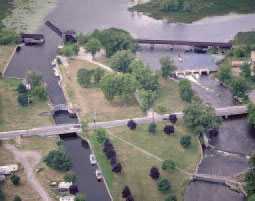 Both a road and railway cross the canal