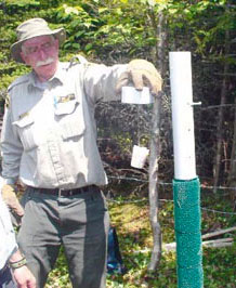 Warden working at a scent post