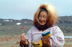 Inuvialuit Elder holding a flower