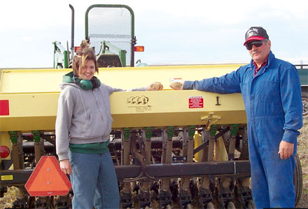 Park warden with farm equipment
