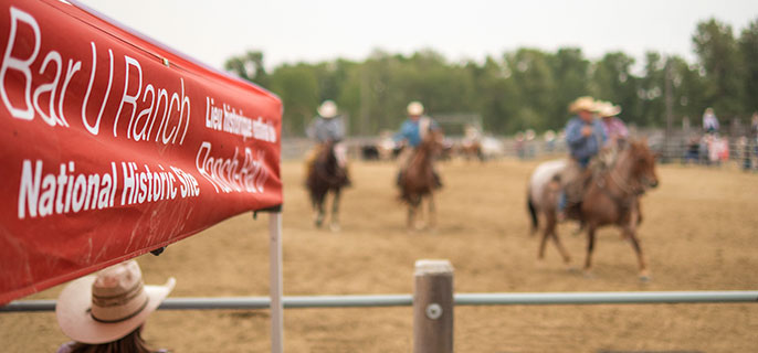 Cowboys in action at the Bar U Ranch rodeo arena