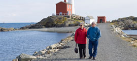 A couple of seniors walk back from Fisgard Lighthouse.