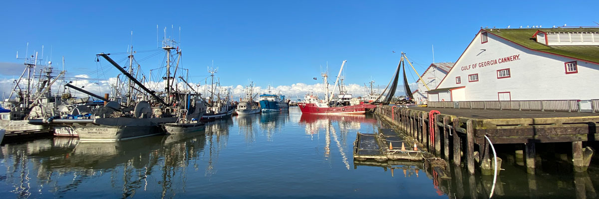 The Gulf of Georgia Cannery and fishing boats in Steveston Harbor.
