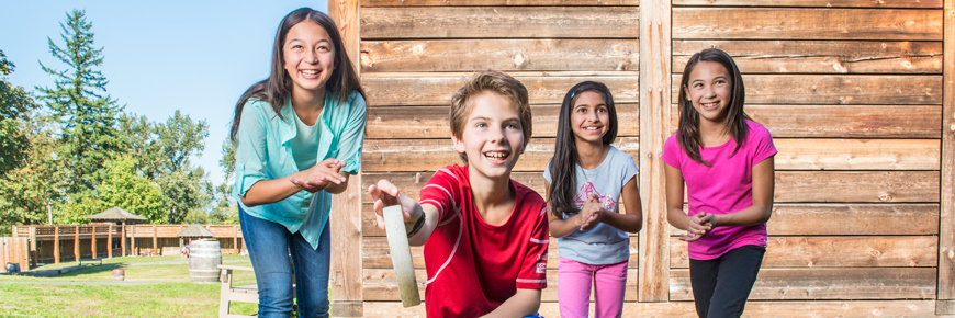 Four students participating in a relay game