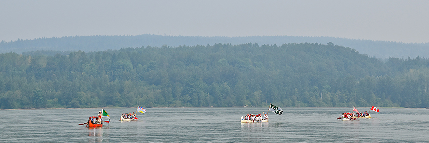 canoe re-enactment at the river