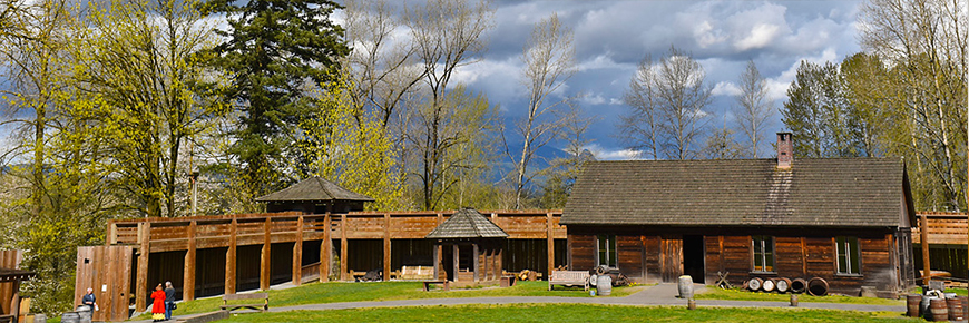 Scenic photo of Fort Langley’s wooden buildings and wall
