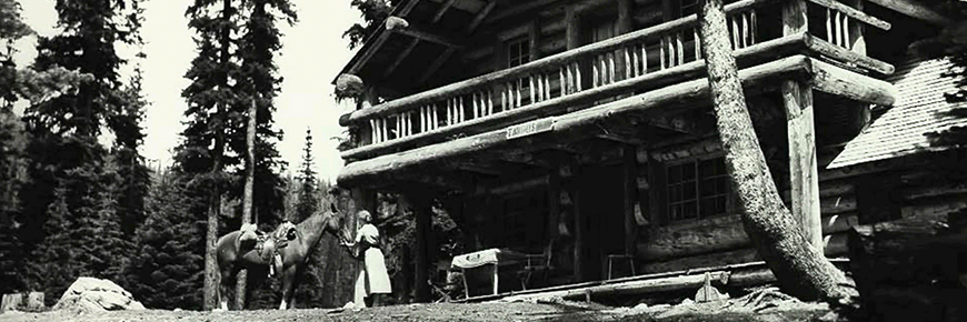 Woman and horse in front of Twin Falls Chalet