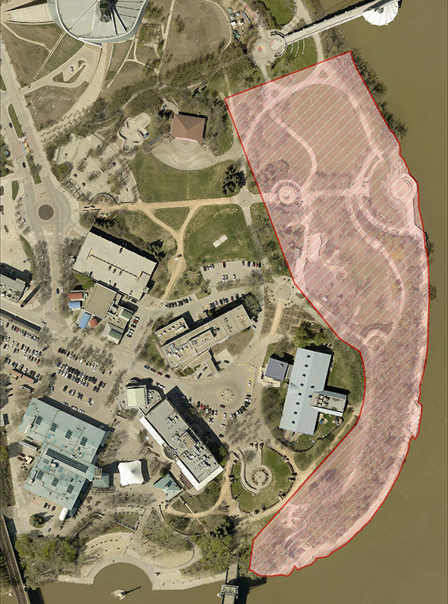 An aerial view of The Forks, with the boundaries of The Forks National Historic Site outlined.