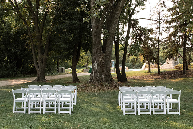 White chairs with an aisle in the middle at The Forks National Historic Site.