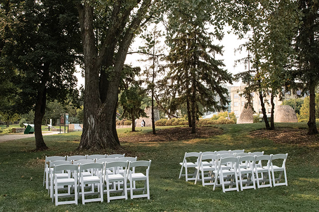 White chairs with an aisle in the middle at The Forks National Historic Site.