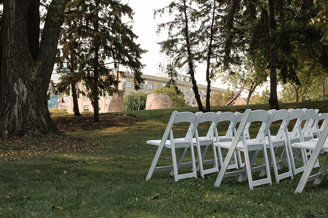 White chairs with an aisle in the middle at The Forks National Historic Site.