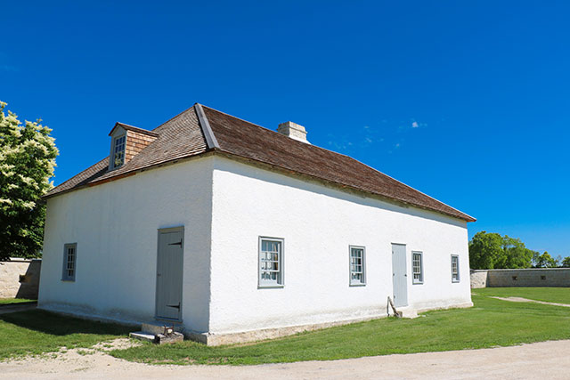 A small white house.