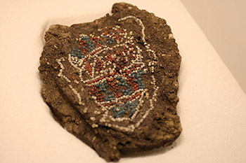 This moccasin bead pattern, an archeological artefact, was discovered beneath the Depot building at York Factory.
