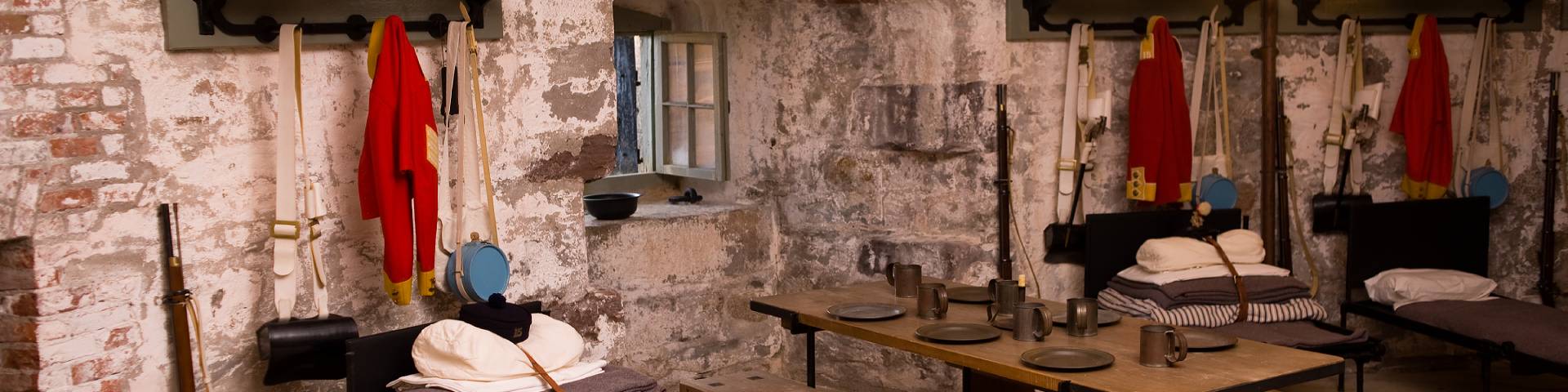 The living quarters of the tower with clothes and beds