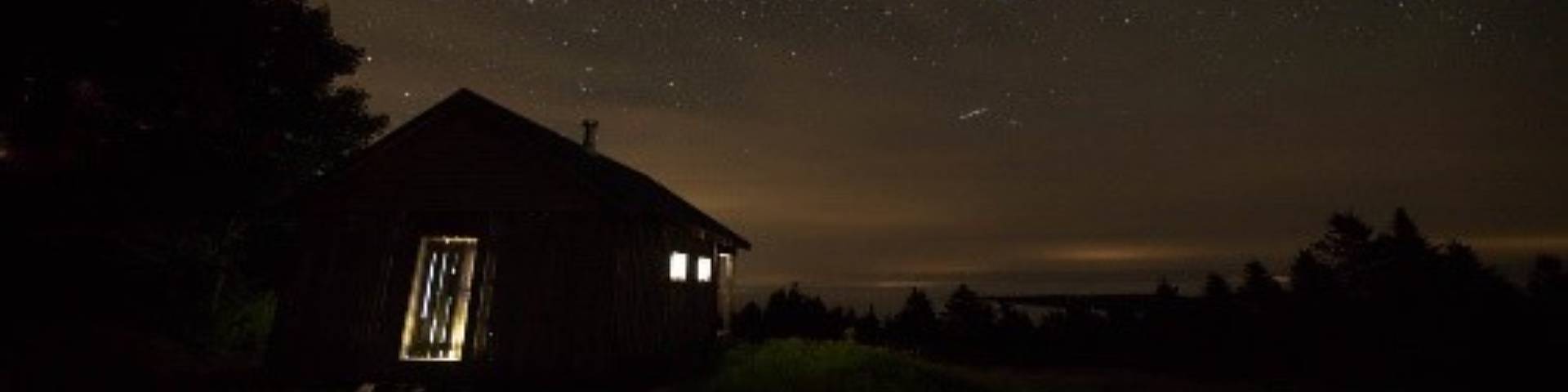 A cabin at night