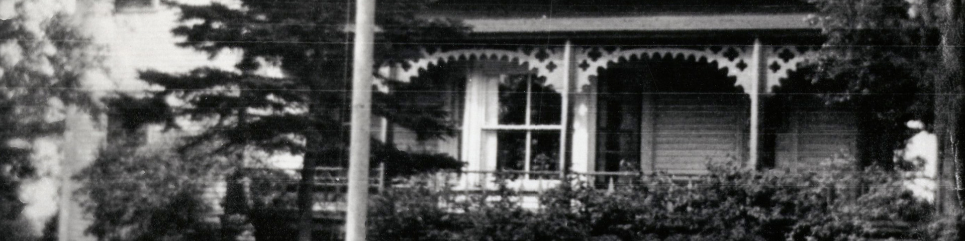 black and white image of a cottage