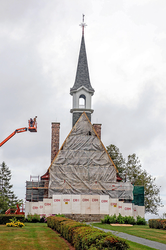 The church wrapped up in construction materials and scaffolding
