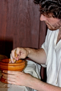 Site interpreter inside Hébert’s apothecary