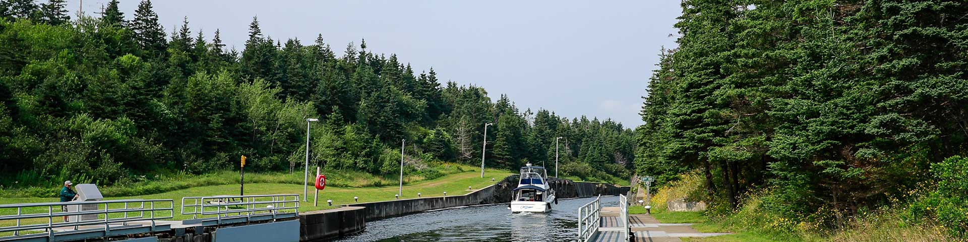 A boat passes through St. Peters Canal