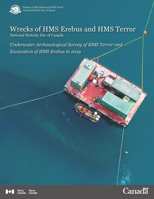 Cover page of archaeological survey report featuring Parks Canada branding, the title of the report, and an aerial photo of a barge floating over a sunken shipwreck.