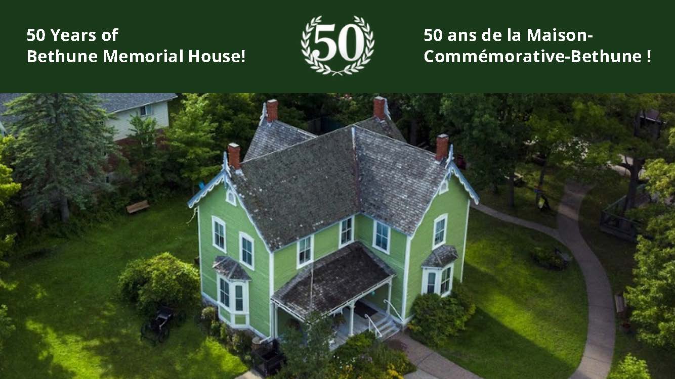 Aerial view of Bethune Memorial House, a green historic home with a banner marking its 50th anniversary.