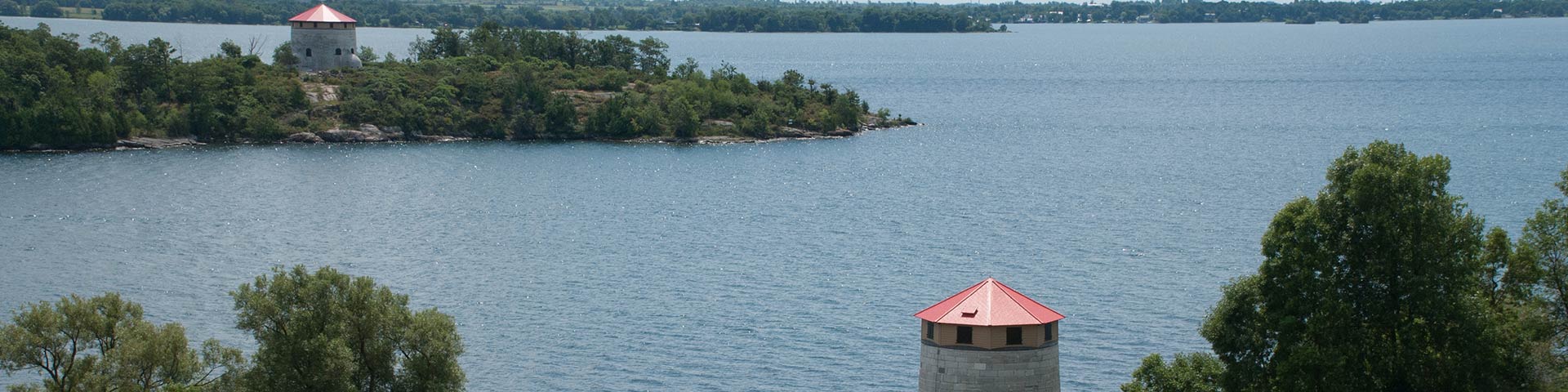 Stone tower along a river.