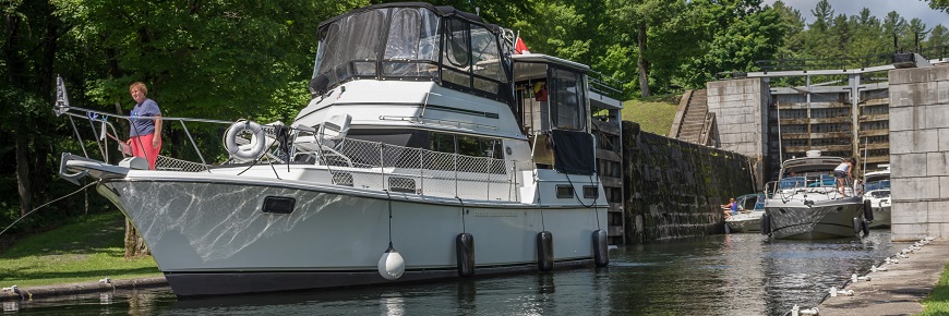 A boat locking through Jones Falls lock