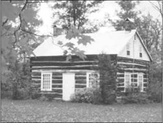 Maison en bois rond sur la route de comté entre Merrickville et Burritt’s Rapids