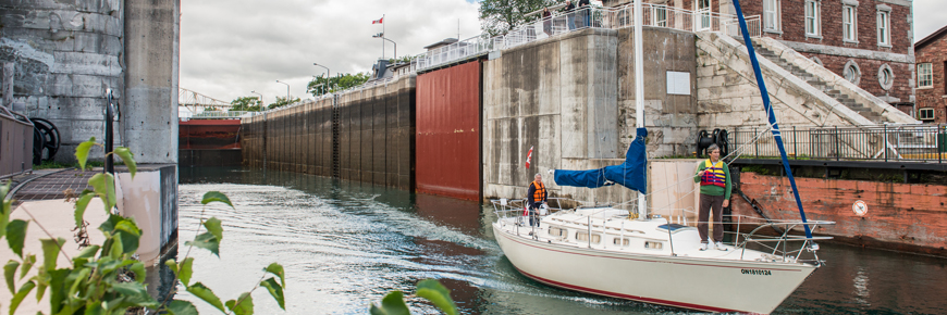 A sailboat exiting the lock.