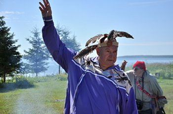 A man wearing a headdress