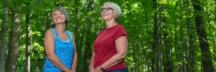 Two women in the forest.