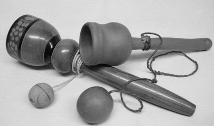 A traditional wooden ball and cup toy