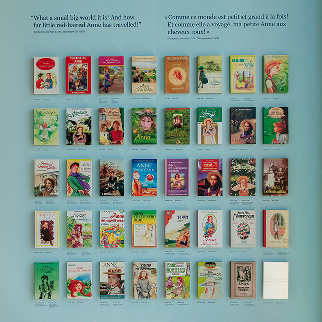 A wall with the covers of all the languages Anne of Green Gables has been published in.