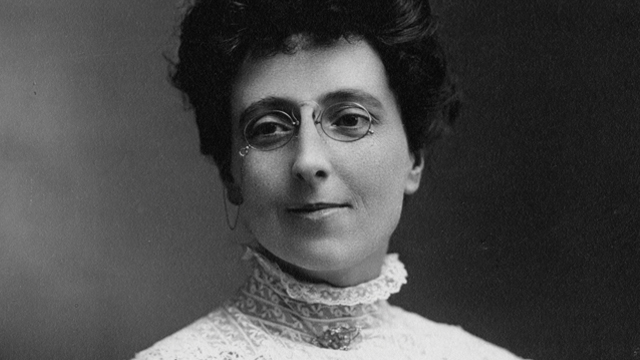 A black and white portrait of Lucy Maud Montgomery