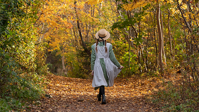 Anne walks down Lovers Lane in the fall.