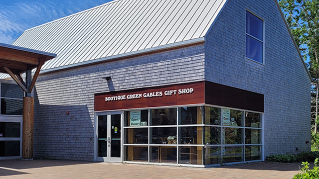 A low smooth slope walkway leads to the exterior door to the Visitor Information Centre giftshop