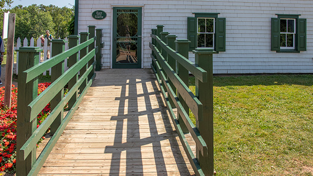 A direct view of the ramp leading to the back door of Green Gables House. 