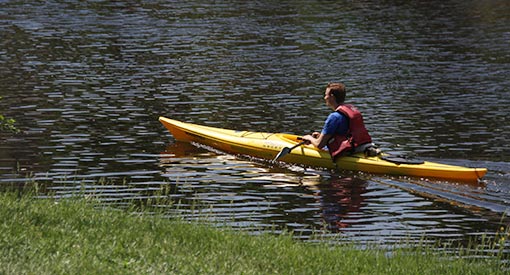 Enjoy the calm waters of the Lachine Canal for a kayak ride.