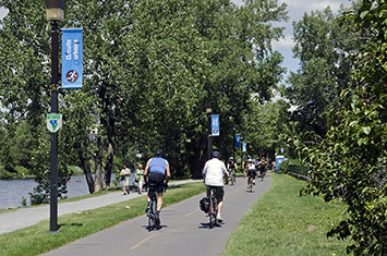 Cyclist and joggers on the Lachine Canal path