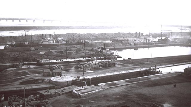 Historic view of the Lachine Canal locks and industrial facilities in Montreal.