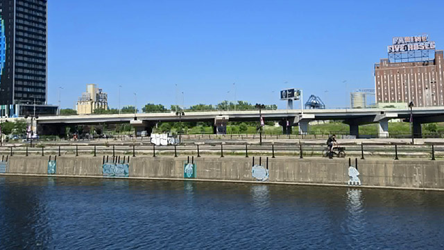 Public art installations displayed along the waterfront wall of the Canal-de-Lachine.