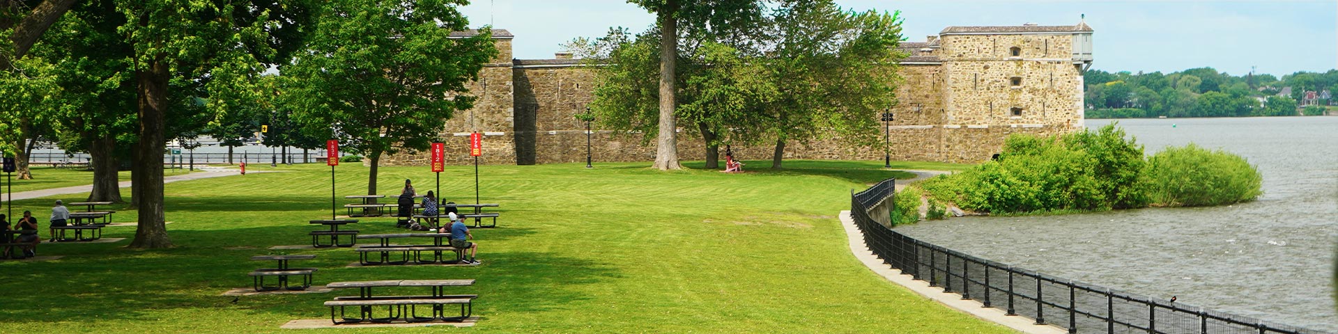 The park at Fort Chambly National Historic Site, which is packed with picnickers enjoying views of the fort and Bassin de Chambly.