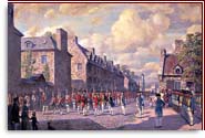 Man wearing the red uniform of the British army and holding a flint lock musket in his left hand