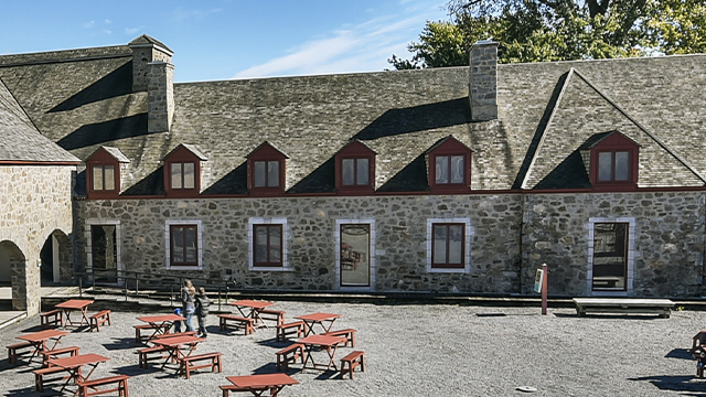 View of the open courtyard of Fort Chambly National Historic Site in full sunlight.