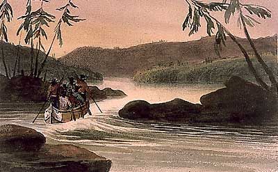 A canoe enters the rapids