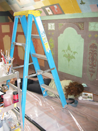 Restorers at work on the western wall of Napoléon Bourassa's studio