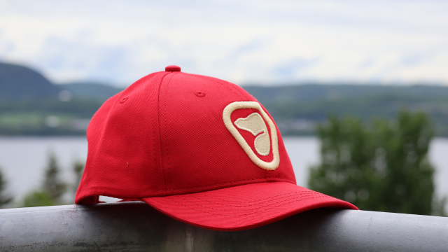 Red cap with Parks Canada beaver logo