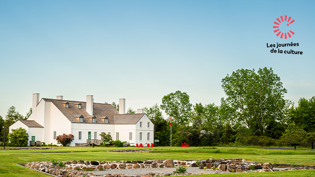 The Ironmaster’s House of the Forges du Saint-Maurice National Historic Site in summertime.